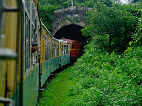 Toy Train from Kalka to Shimla passing through a dark tunnel