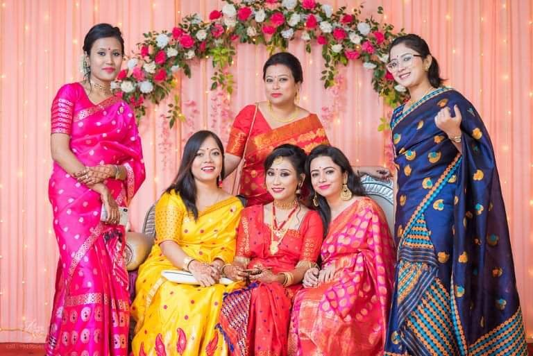 Assamese girls flaunting colourful paat mekhela sador saree