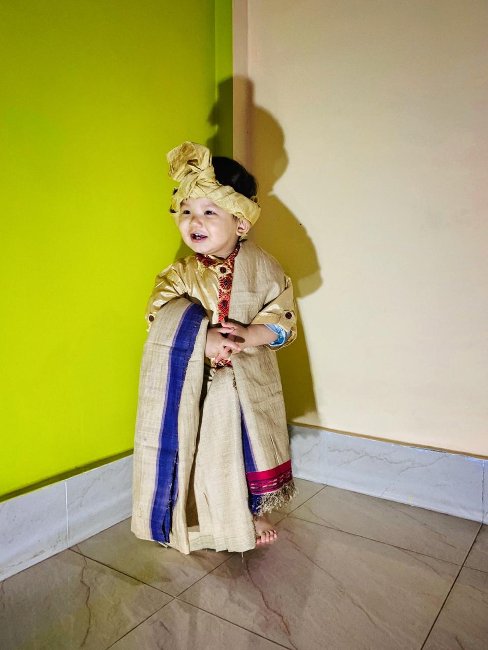 Ahom dress worn by a child